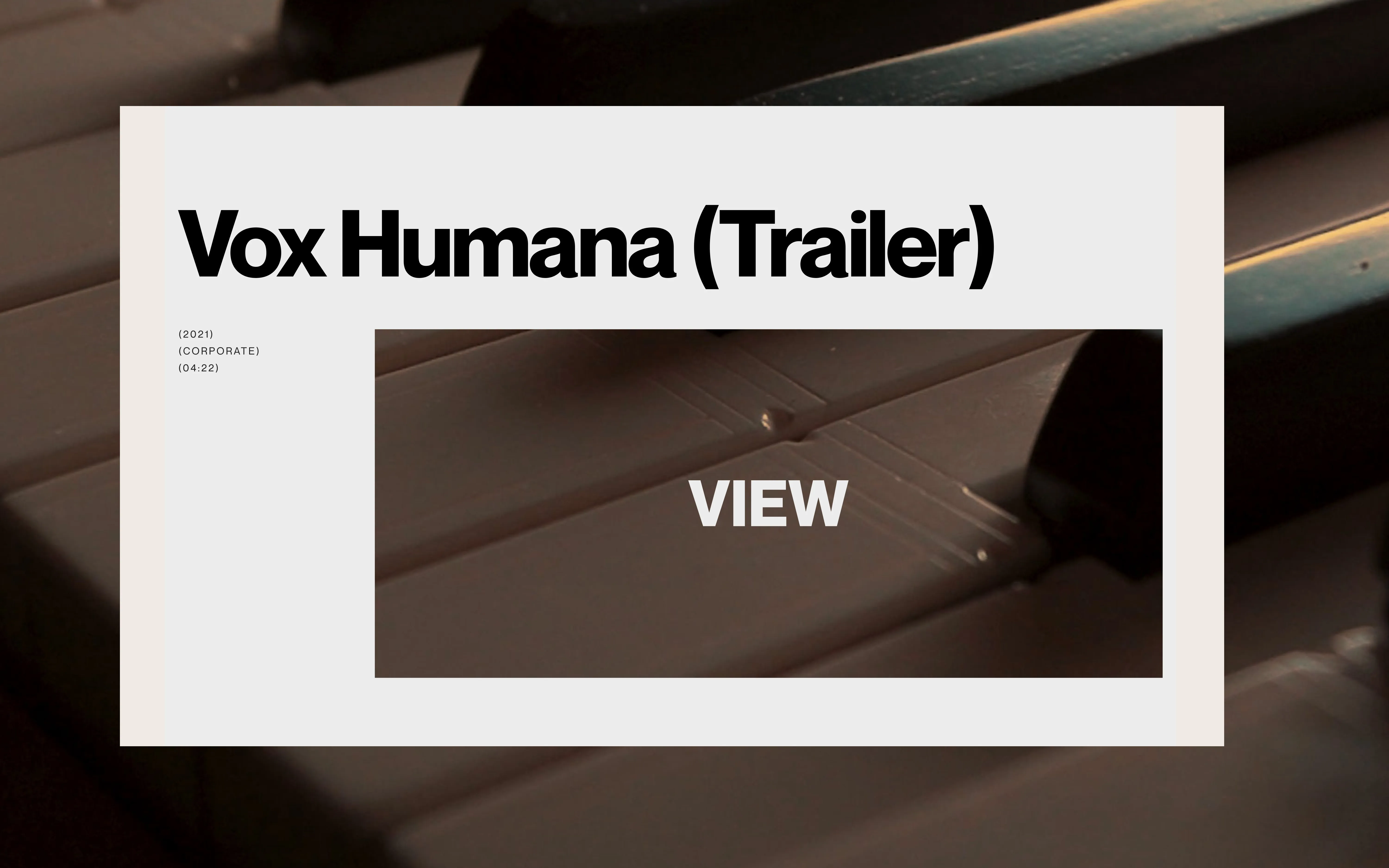 Close-up of piano keys with overlaid text 'Vox Humana (Trailer)' and 'VIEW' button.