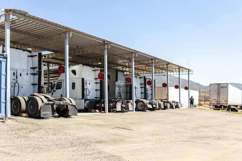 Fleet trucks in a repair bay 