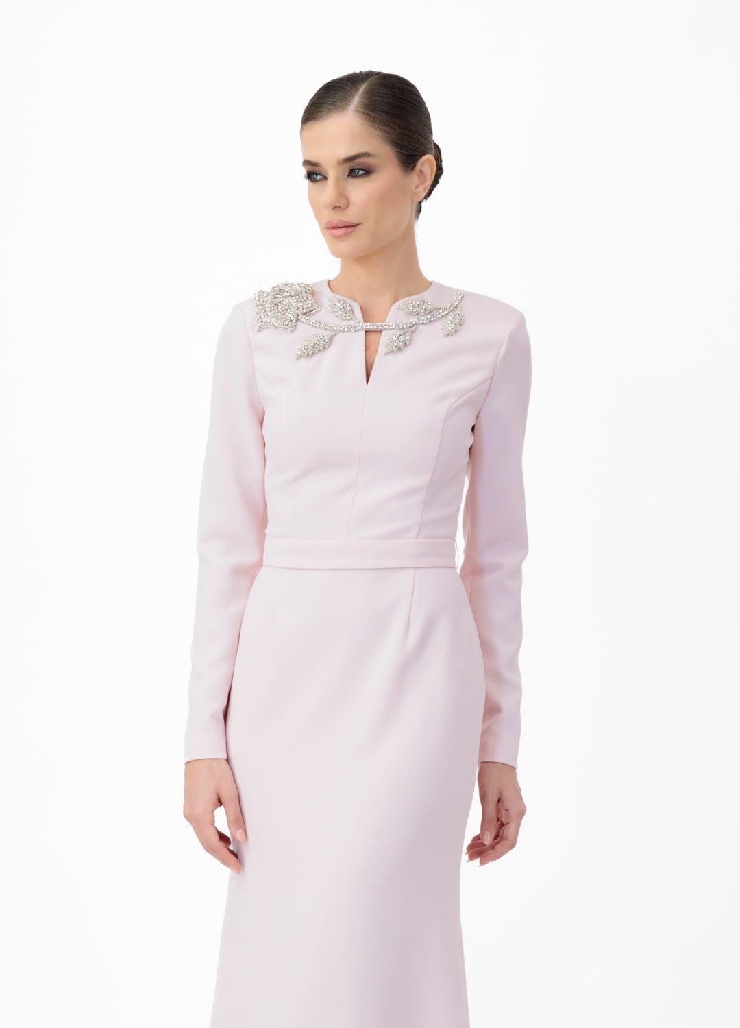 Pink dress MA2025P20022 BP- Long sleeve maxi dress with decorative belt, embellished with stone roses. Zipper in the center of the back.