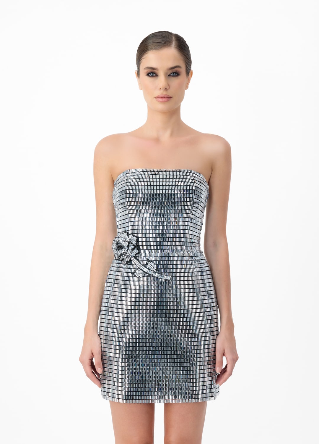 Silver dress AE2025P0016- Open-shoulder dress studded with sparkling rhinestones and a decorative rose. Zipper at back center back.