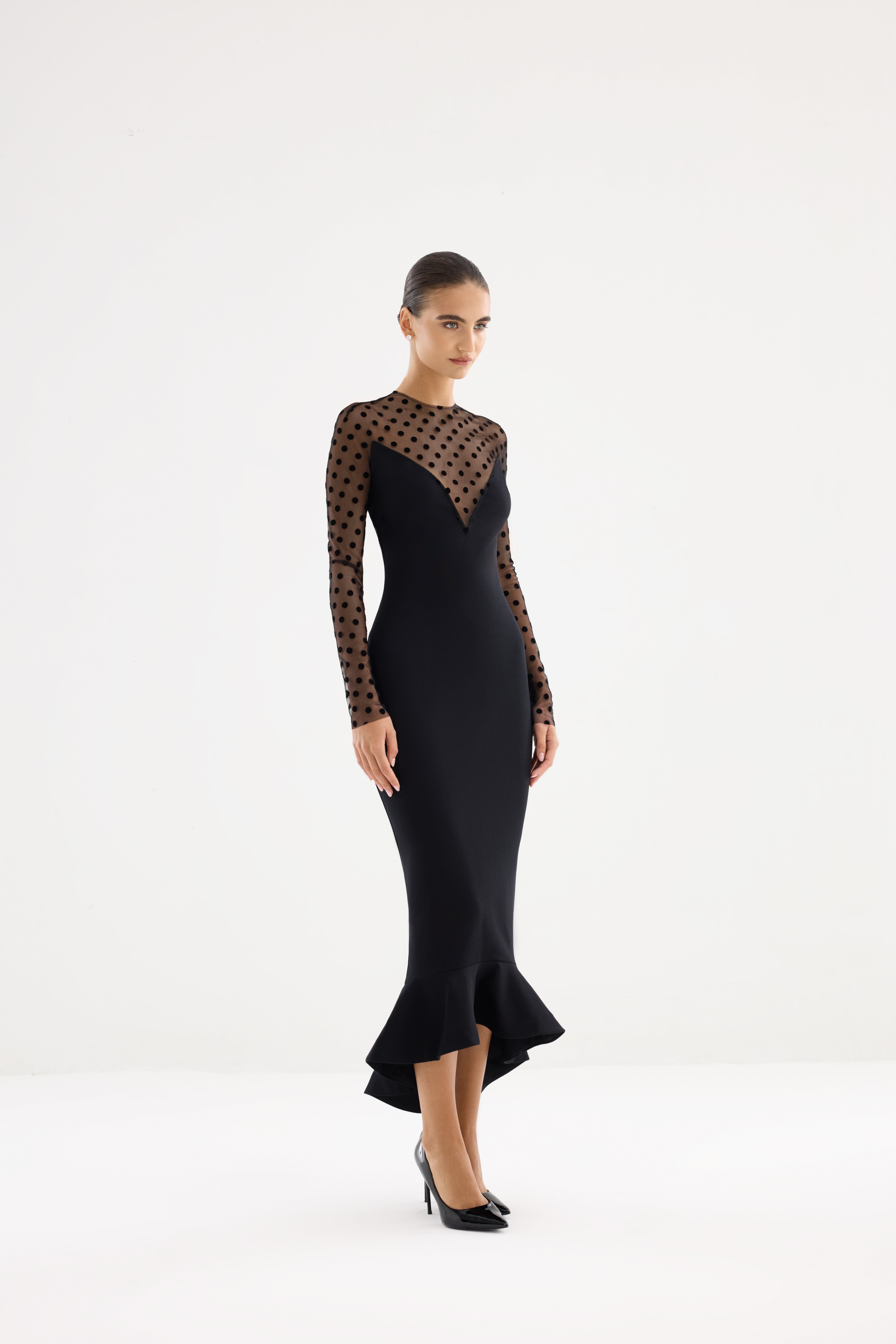 Black dress AE2026P0012 - Fitted dress with an open top and mesh sleeves. Zipper closure at the center back. - ADAMARIS - the international brand 