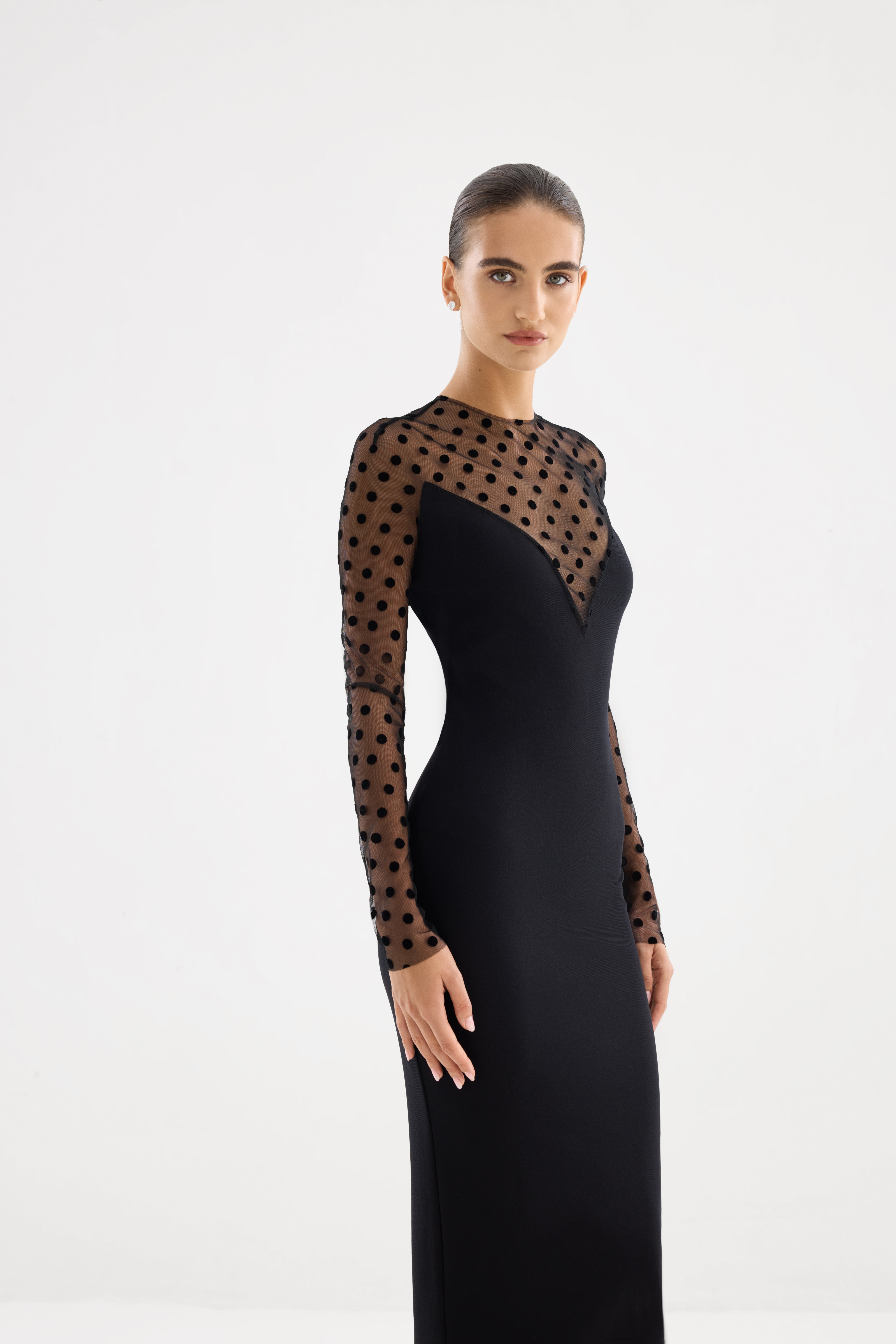 Black dress AE2026P0012 - Fitted dress with an open top and mesh sleeves. Zipper closure at the center back. - ADAMARIS - the international brand 