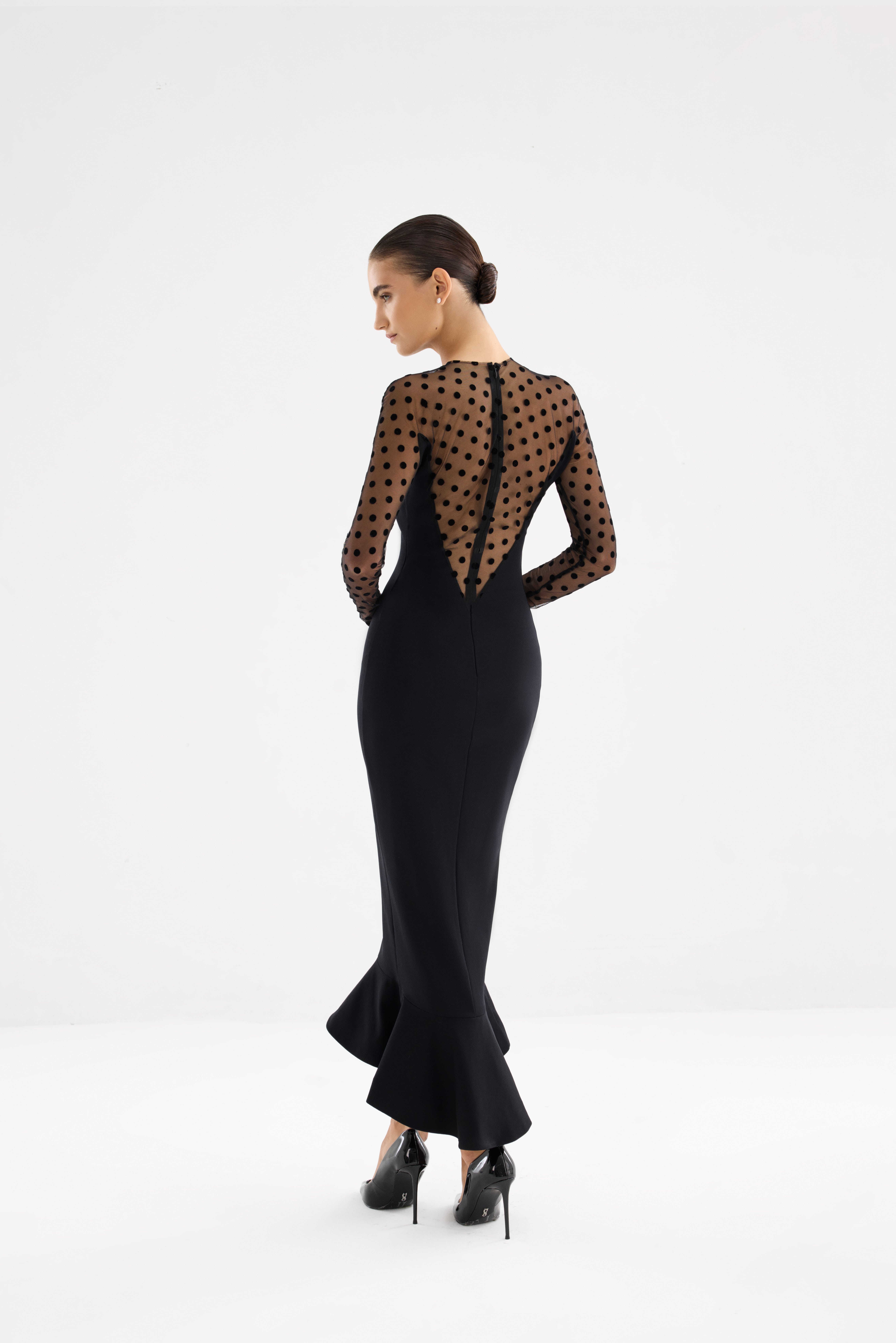 Black dress AE2026P0012 - Fitted dress with an open top and mesh sleeves. Zipper closure at the center back. - ADAMARIS - the international brand 