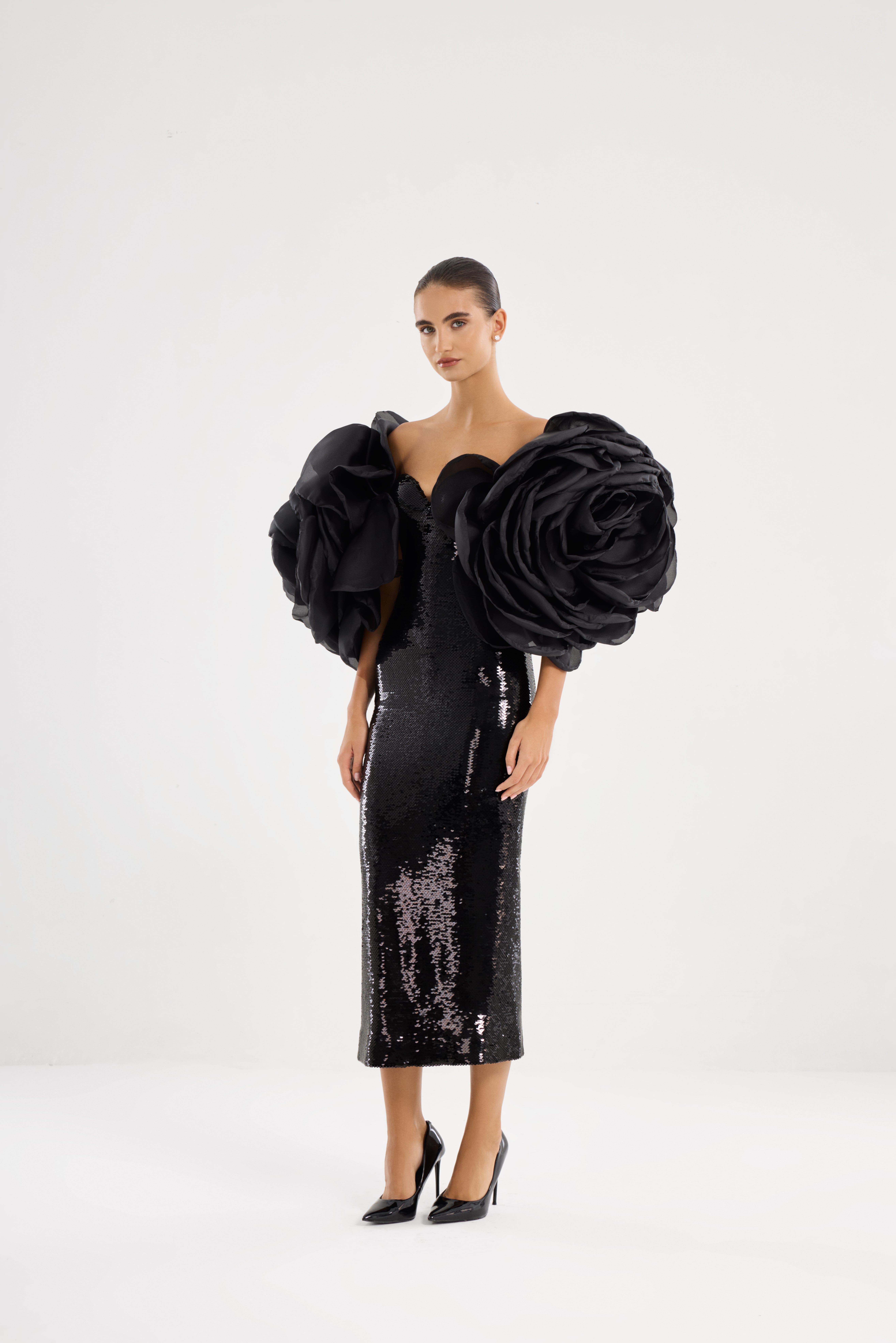 Black dress AE2026P0011 -Dress sewn with sequins, with voluminous decorative roses. Zipper fastening at the back in the center.. - ADAMARIS - the international brand 