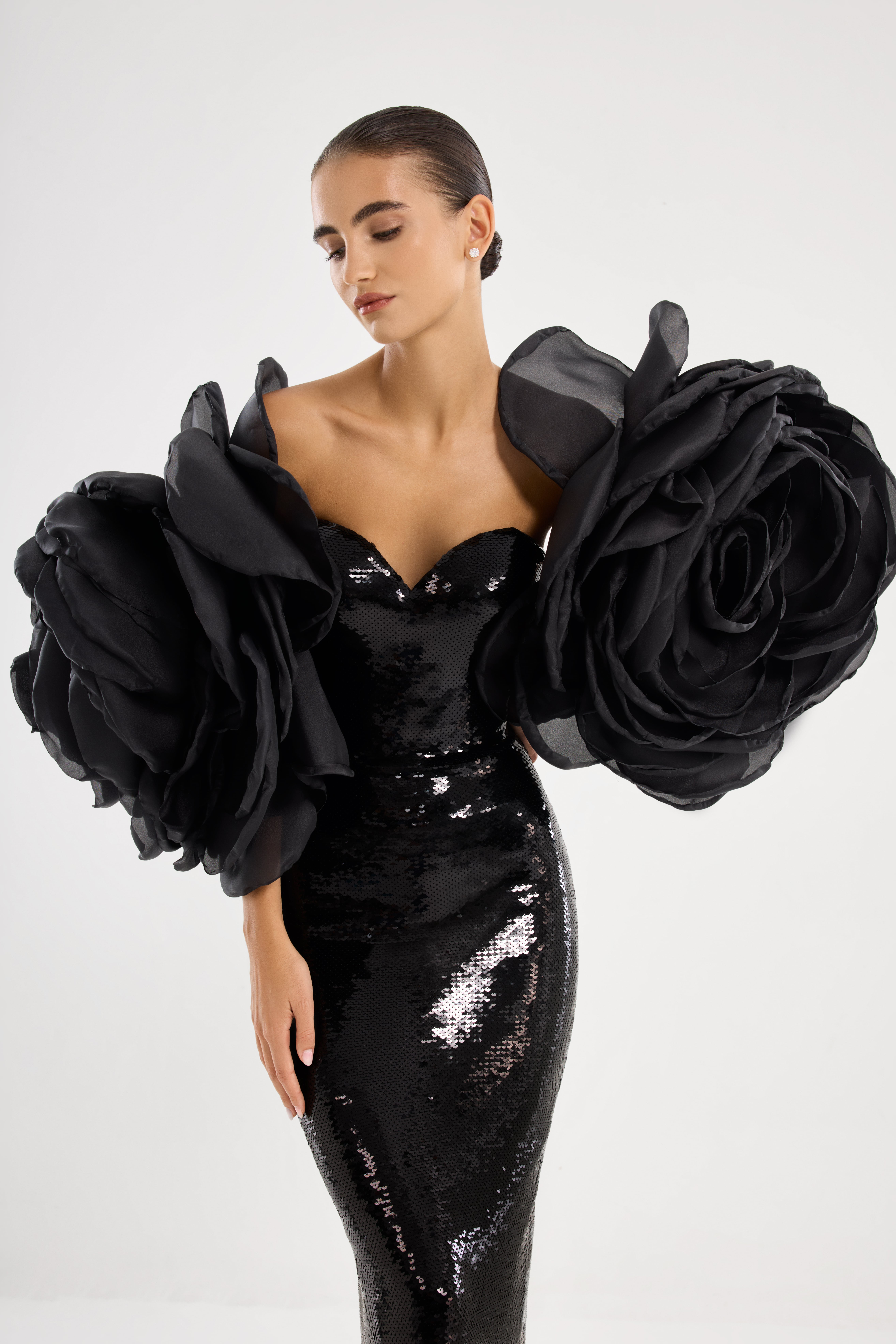 Black dress AE2026P0011 -Dress sewn with sequins, with voluminous decorative roses. Zipper fastening at the back in the center.. - ADAMARIS - the international brand 