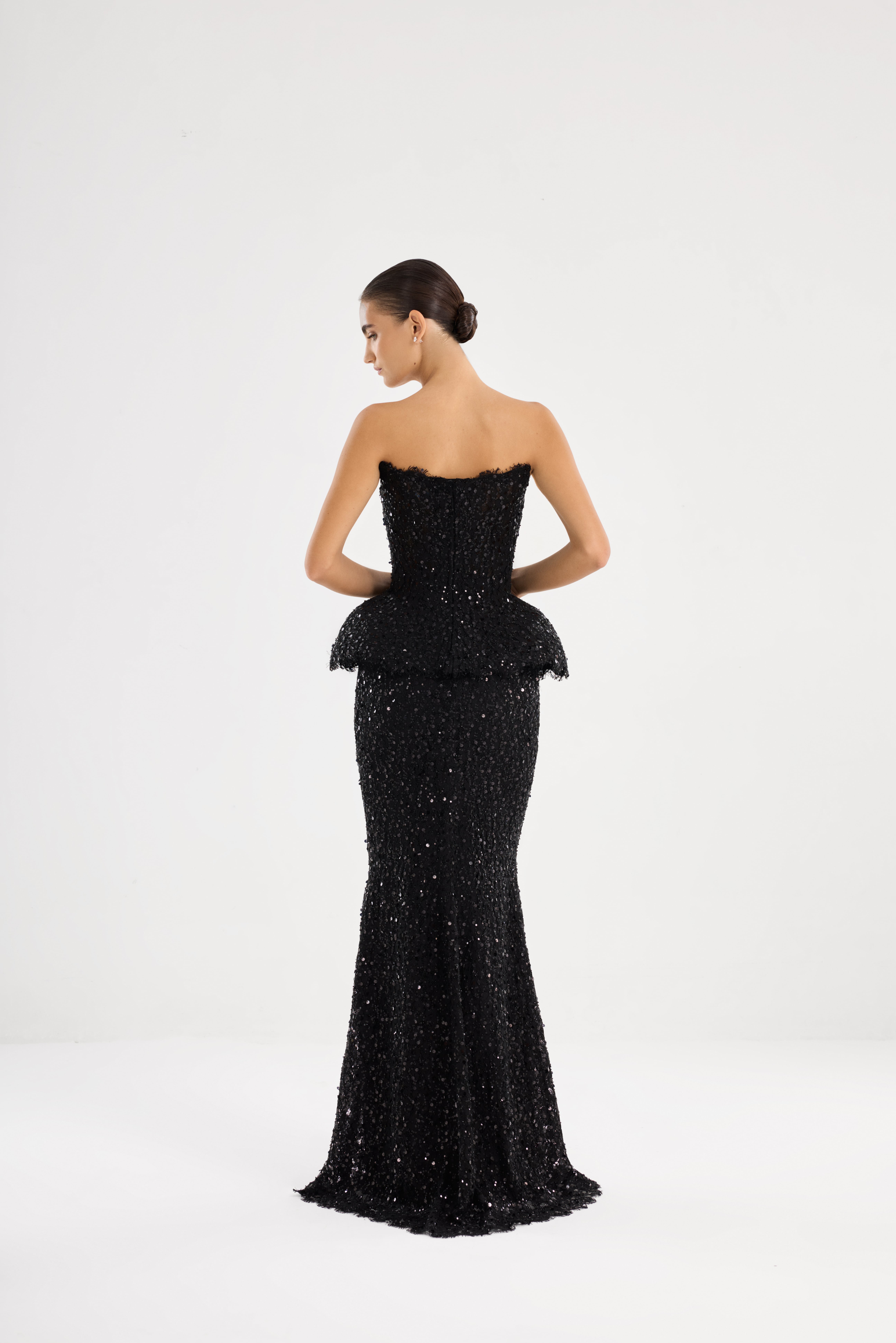 Black suit AE2026P0010 -Sequin-covered suit with an open-shoulder corset and floor-length skirt. Zipper closure at the center back - ADAMARIS - the international brand 