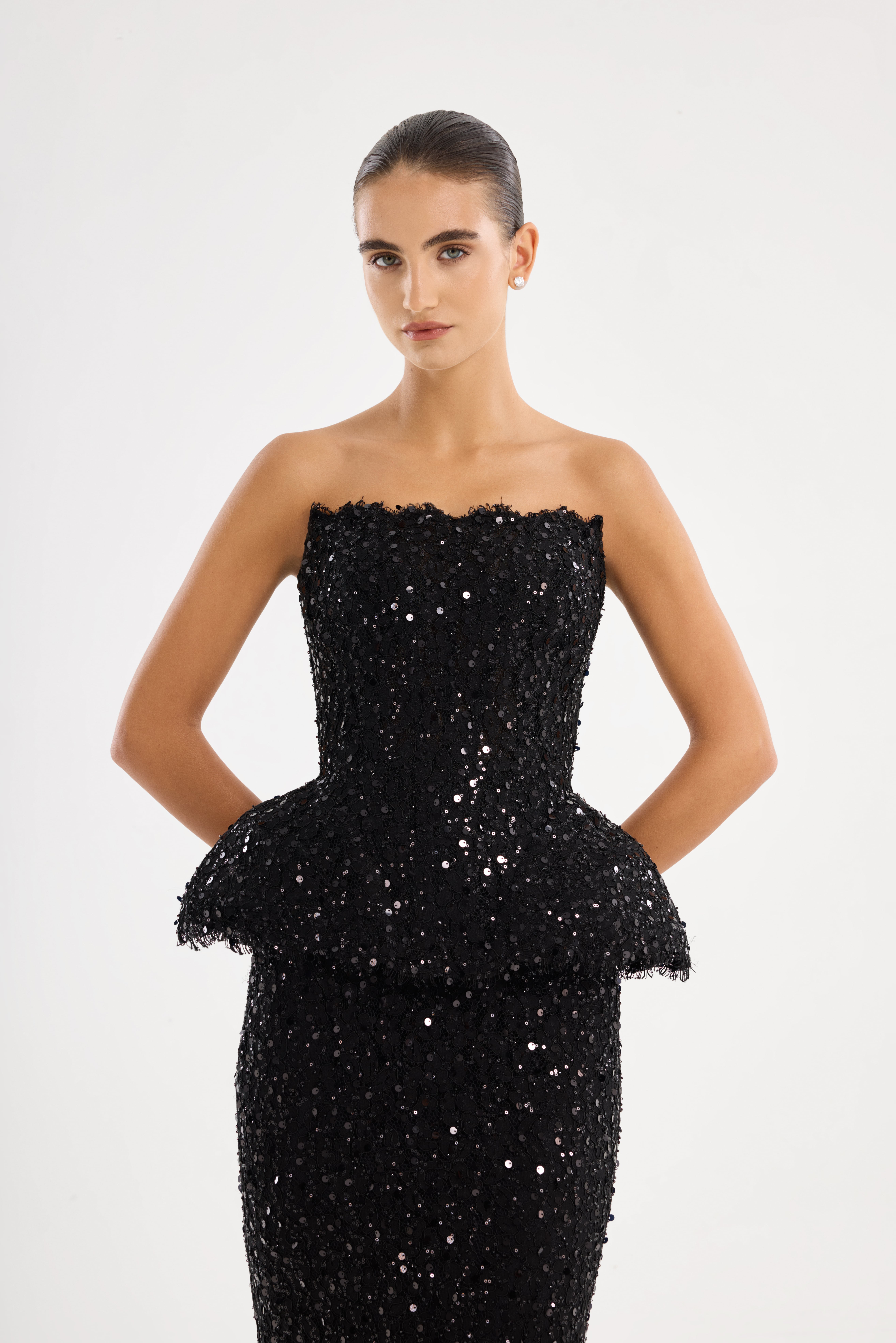 Black suit AE2026P0010 -Sequin-covered suit with an open-shoulder corset and floor-length skirt. Zipper closure at the center back - ADAMARIS - the international brand 