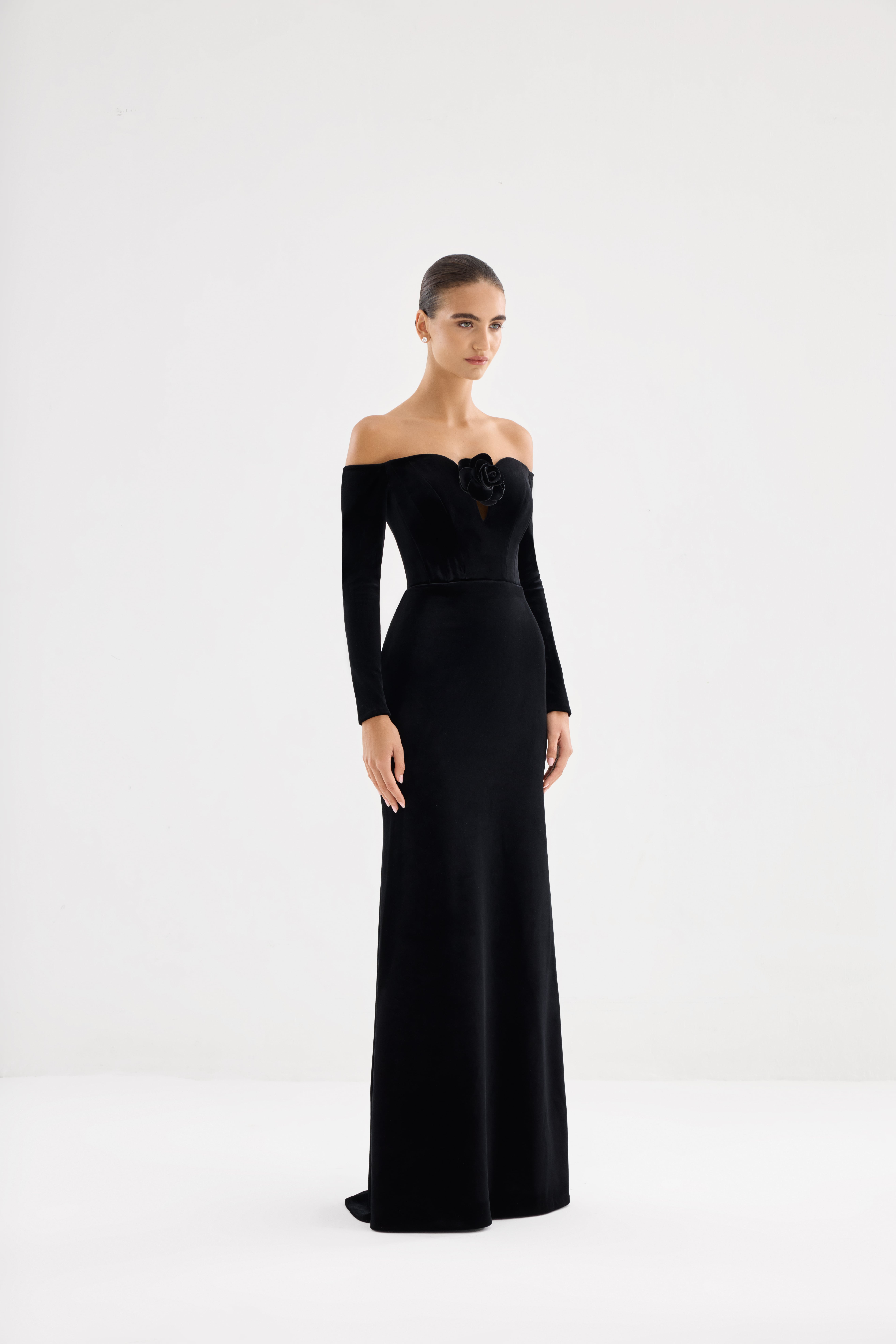 Black dress AE2026P0001 -Maxi-length dress with long sleeves and open shoulders. Zipper closure at the center back.- ADAMARIS - the international brand 