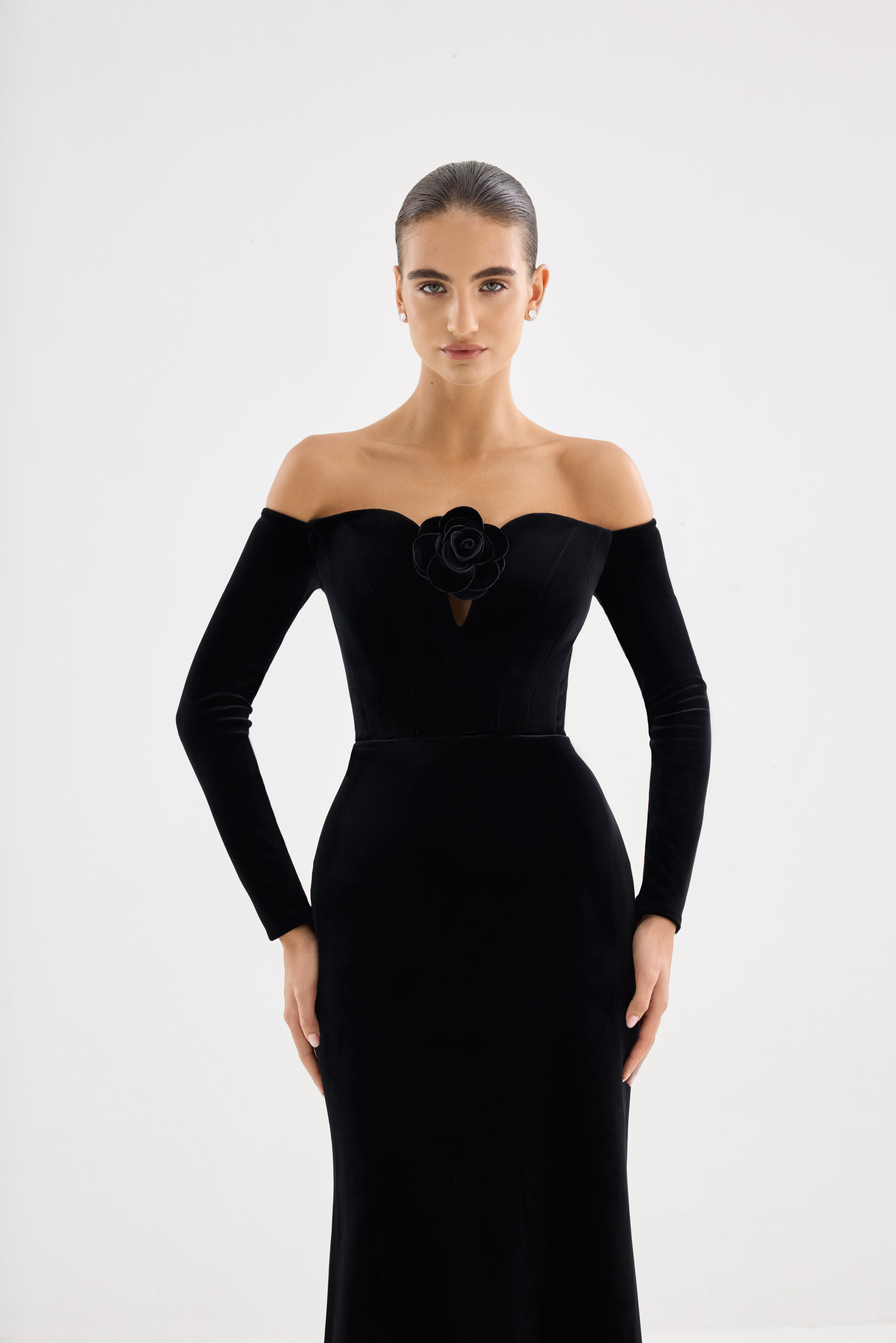 Black dress AE2026P0001 -Maxi-length dress with long sleeves and open shoulders. Zipper closure at the center back.- ADAMARIS - the international brand 