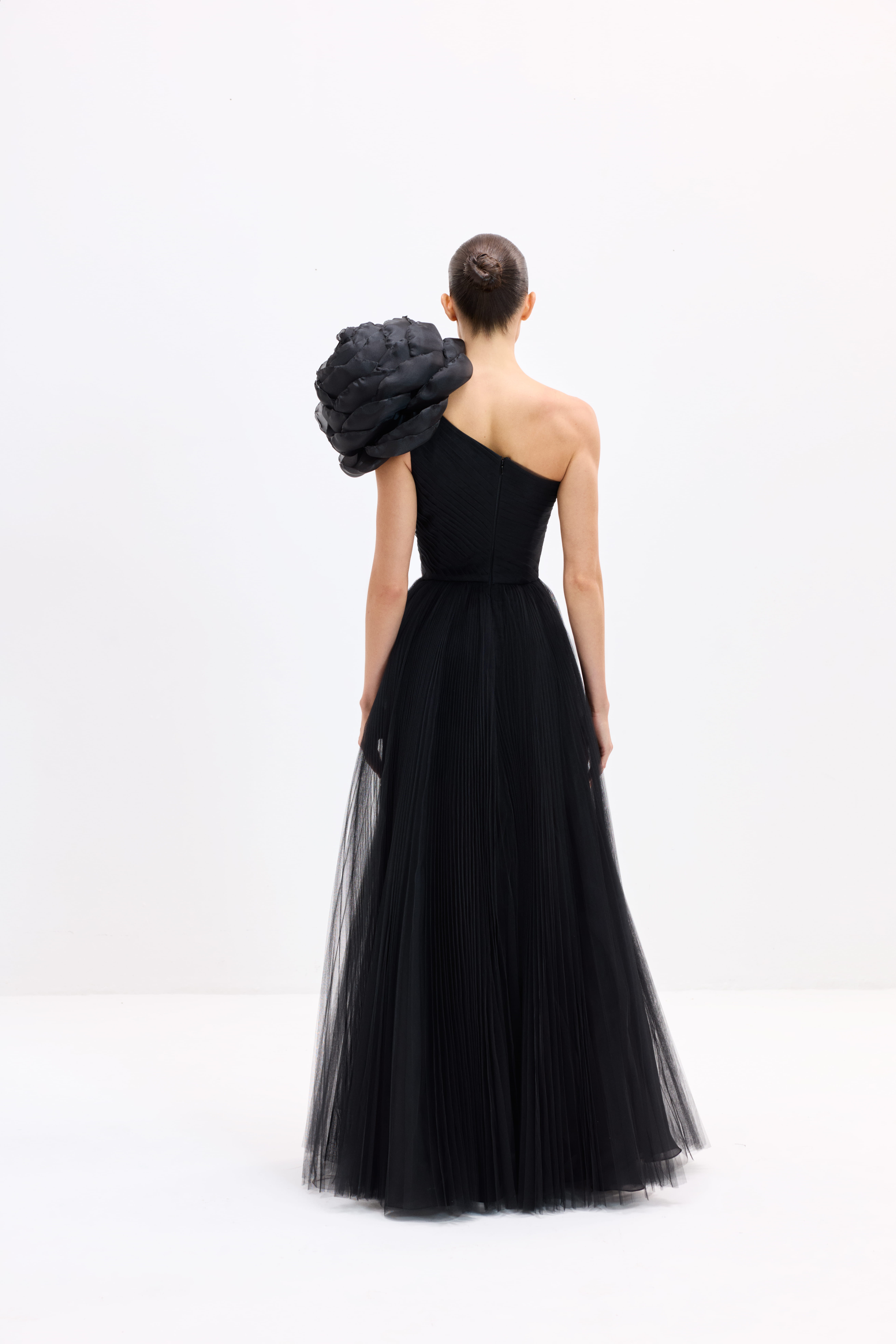 Black dress AES2026P0003- Maxi-length dress with a detachable rose. Center-back zipper closure - ADAMARIS - the international brand 