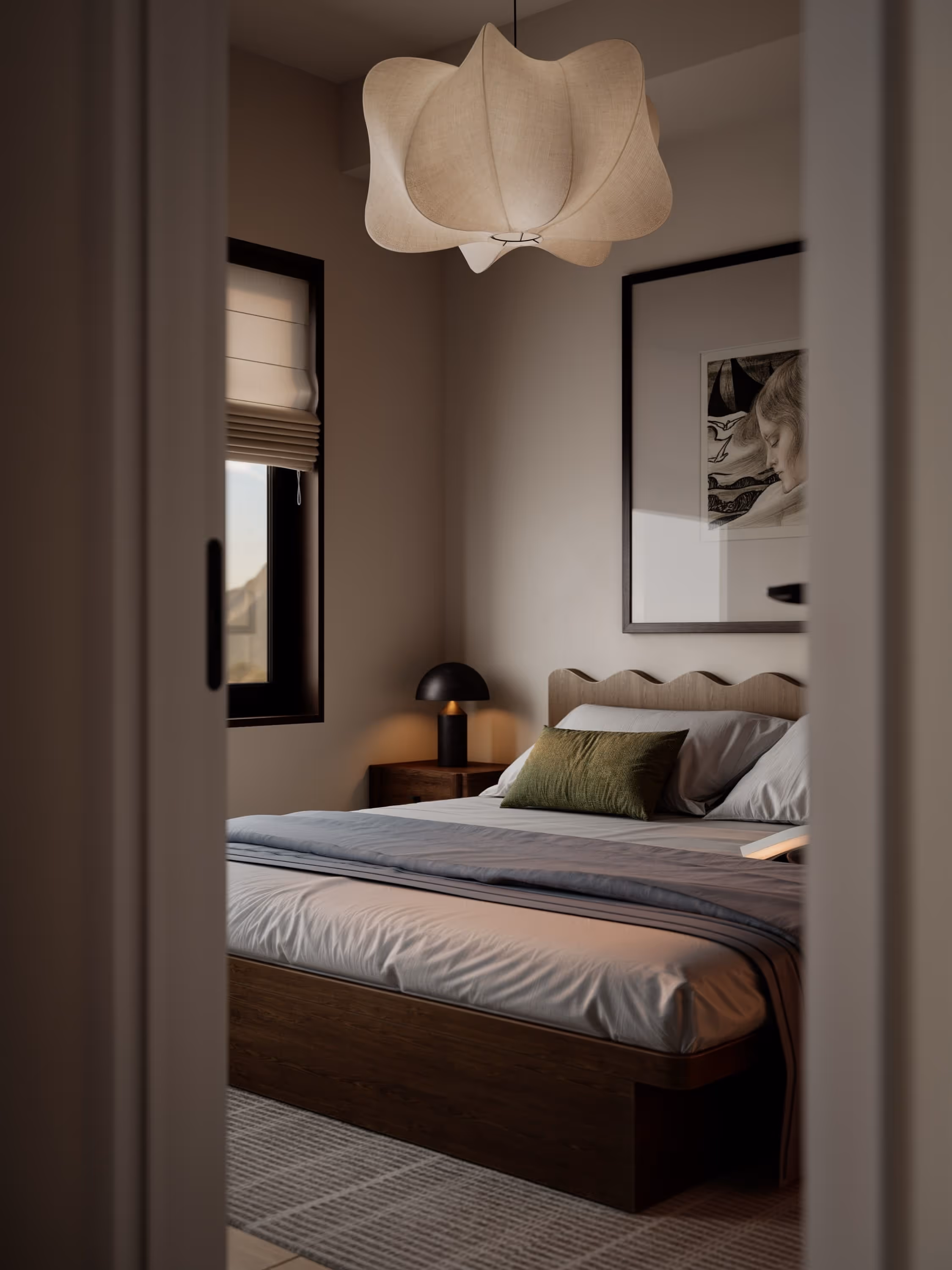 An elegantly designed bedroom featuring a large bed with a stylish headboard. Soft lighting from a unique pendant lamp complements the neutral color palette, creating a cozy ambiance.
