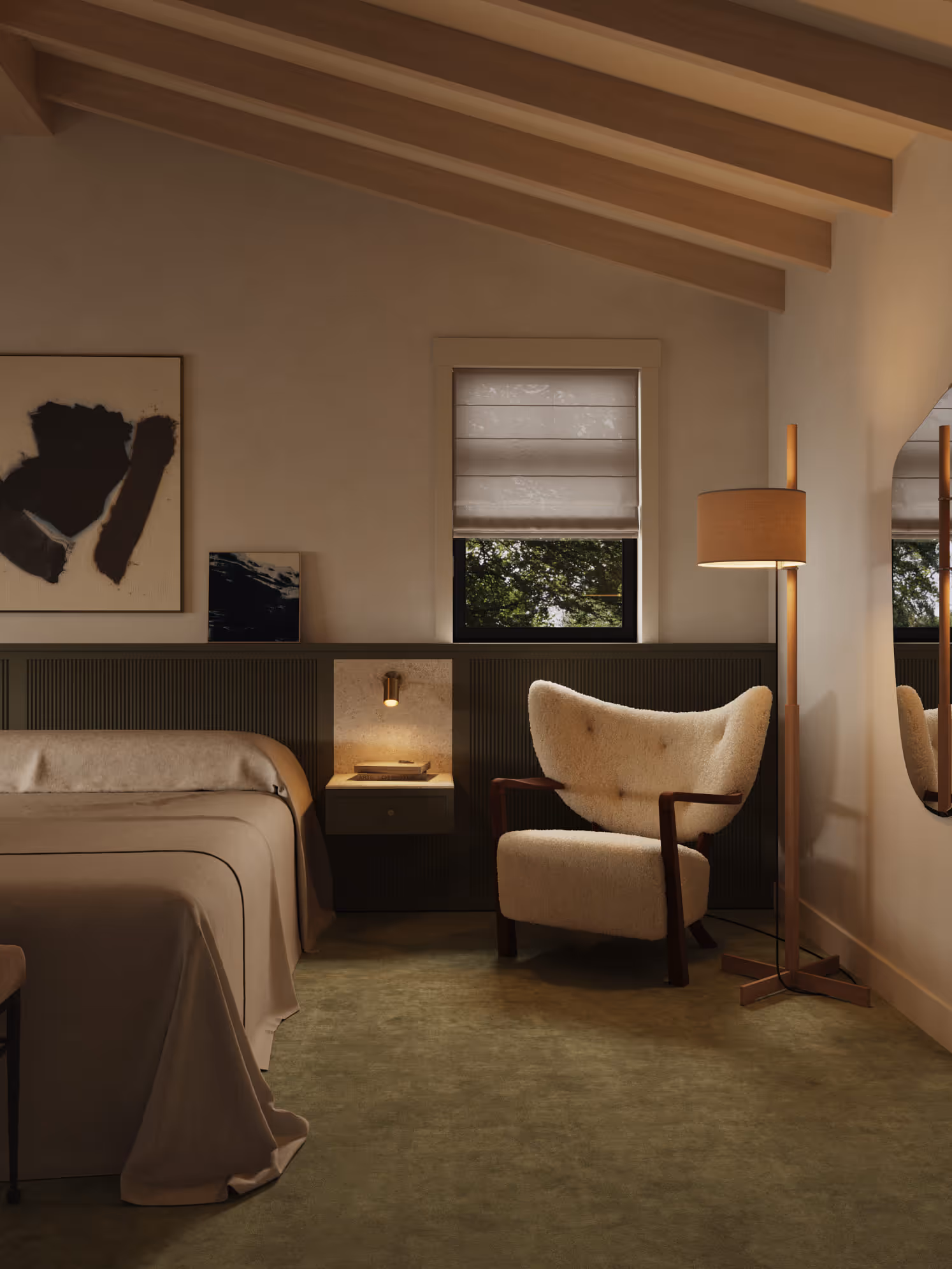 A modern bedroom featuring a beige armchair, warm lighting, and minimalist decor. The design emphasizes comfort with clean lines and soft textures.