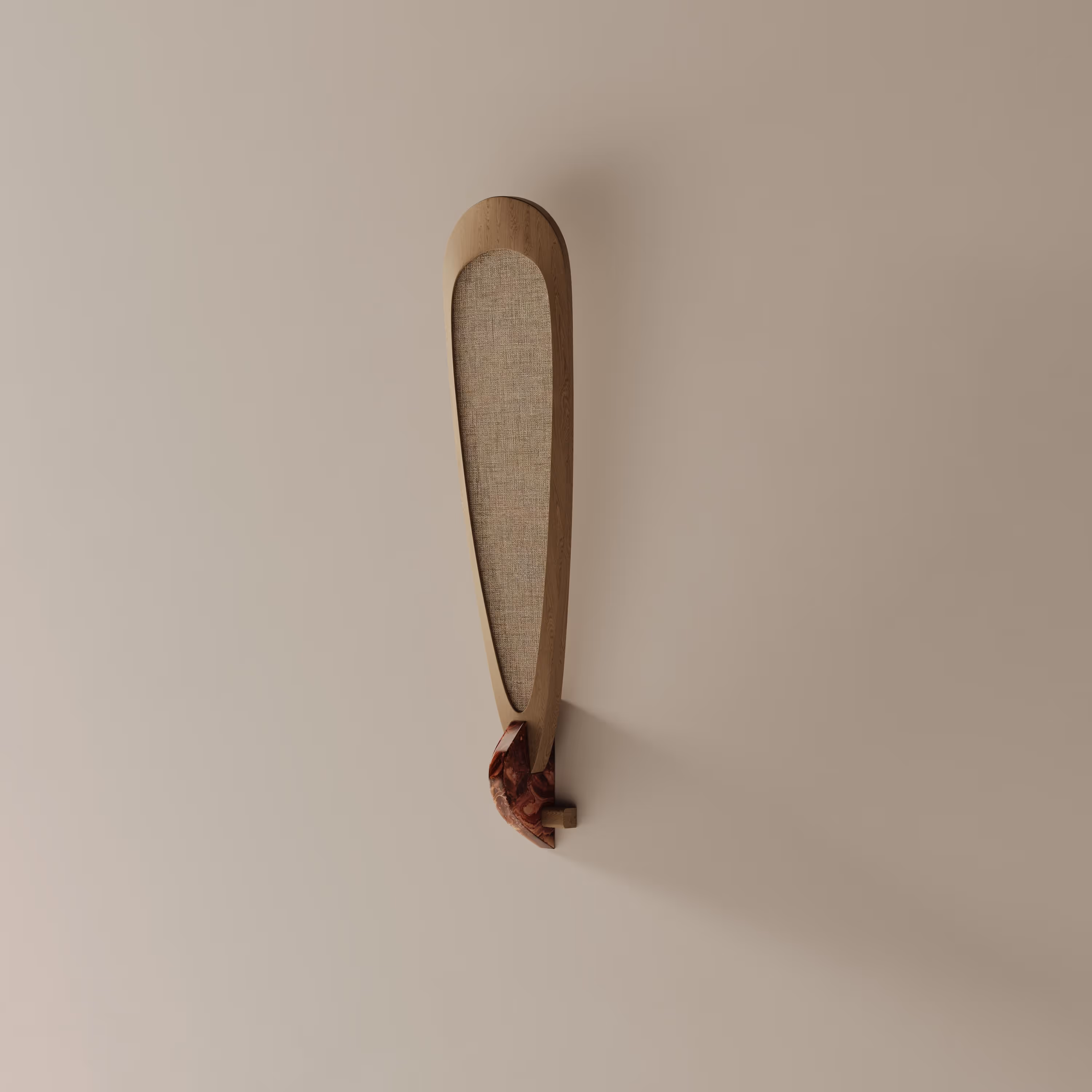 Minimalist wall sconce with a fabric-covered shade and wooden frame, mounted on a neutral wall, showcasing the blend of organic and modern design.