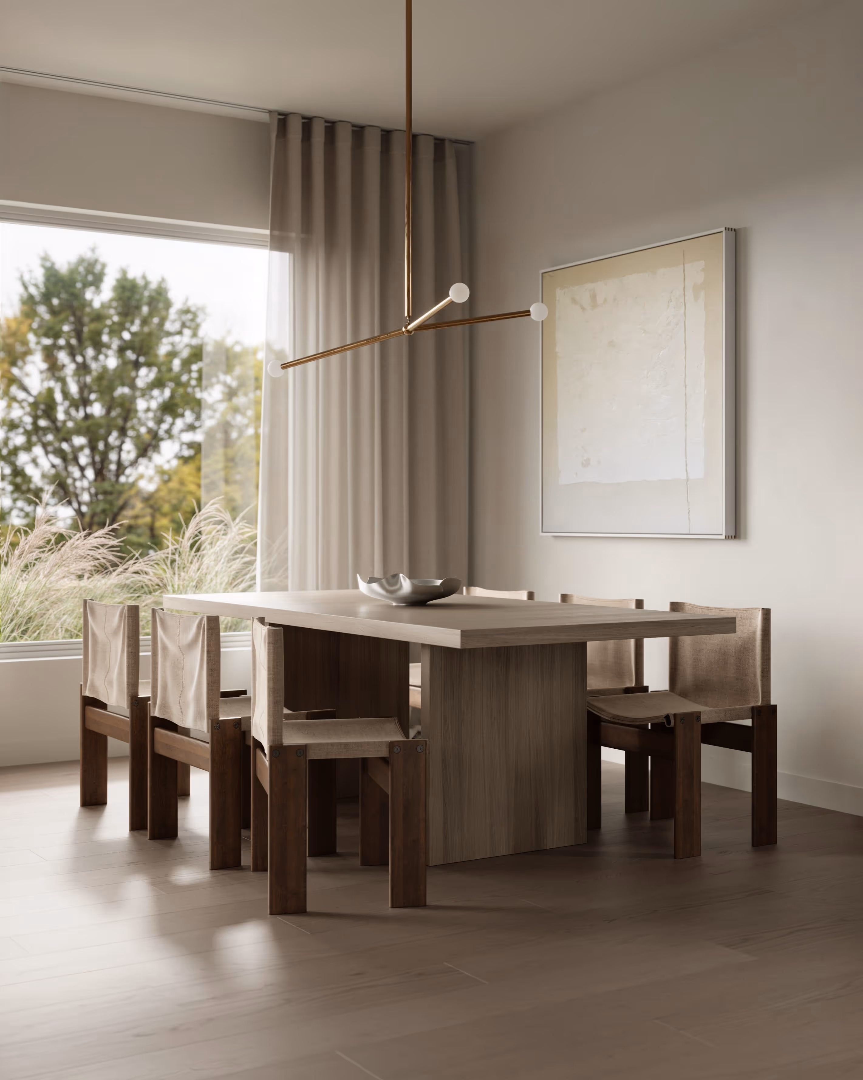 Scandinavian-style dining area with light wooden furniture and large windows overlooking greenery.