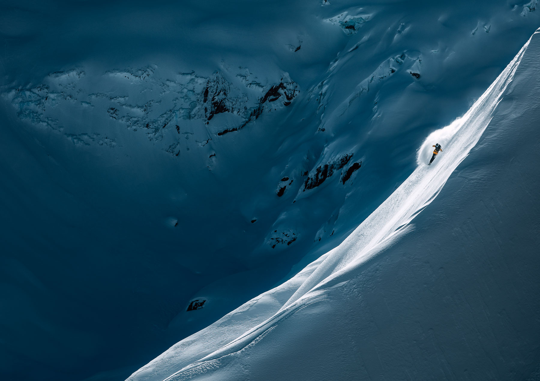 Powder skiing in Mica Heli-Skiing’s mountain terrain
