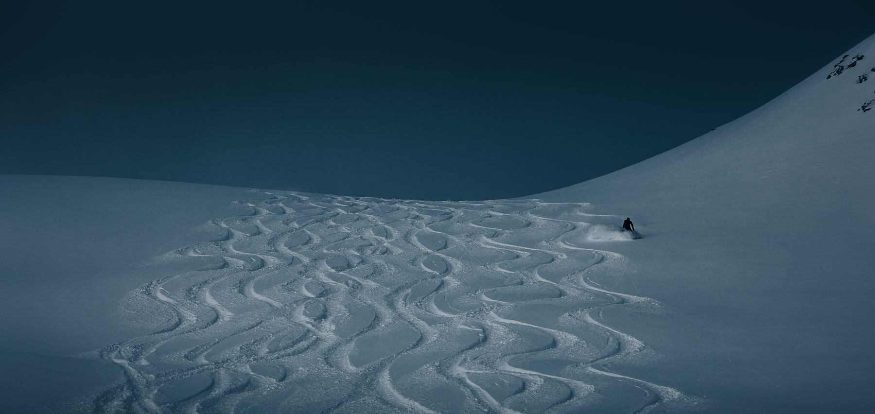 Powder skiing in Mica Heli-Skiing’s mountain terrain