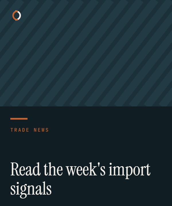 Trade-remedy files, calculator and metal samples on an import compliance desk
