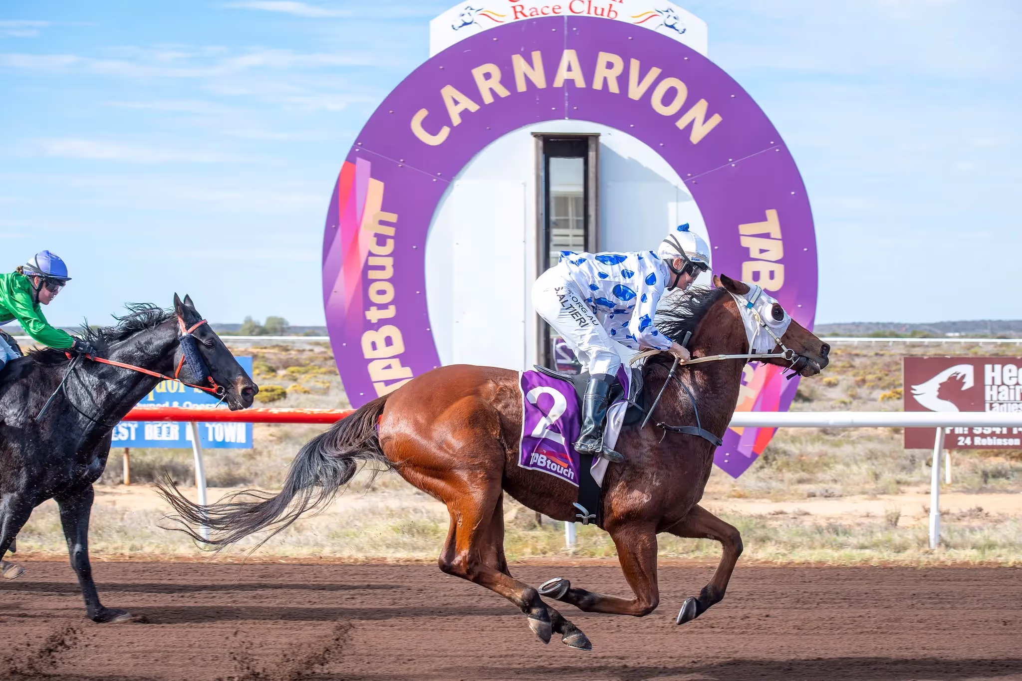 horse crossing finish line