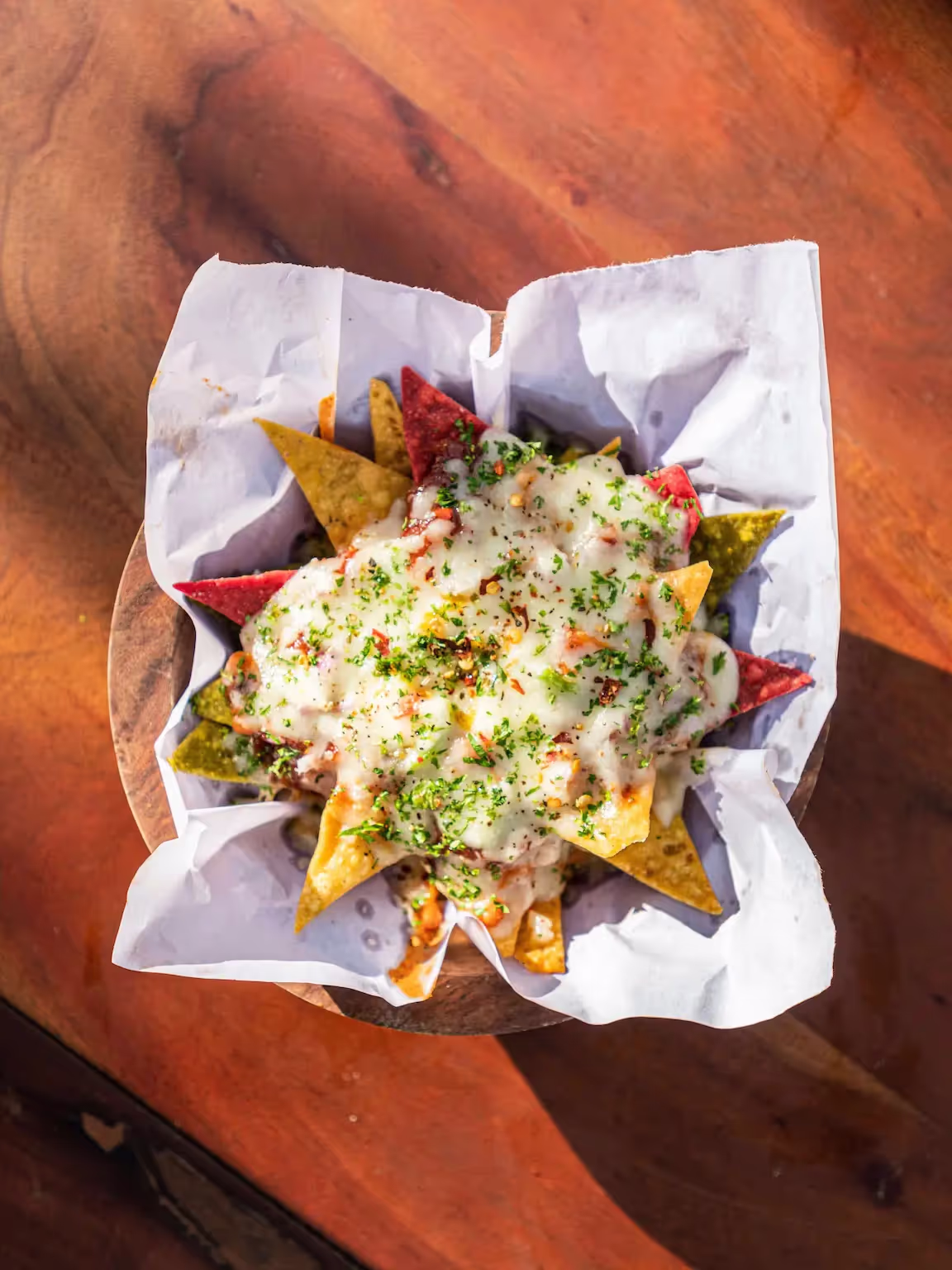 nachos on wooden table