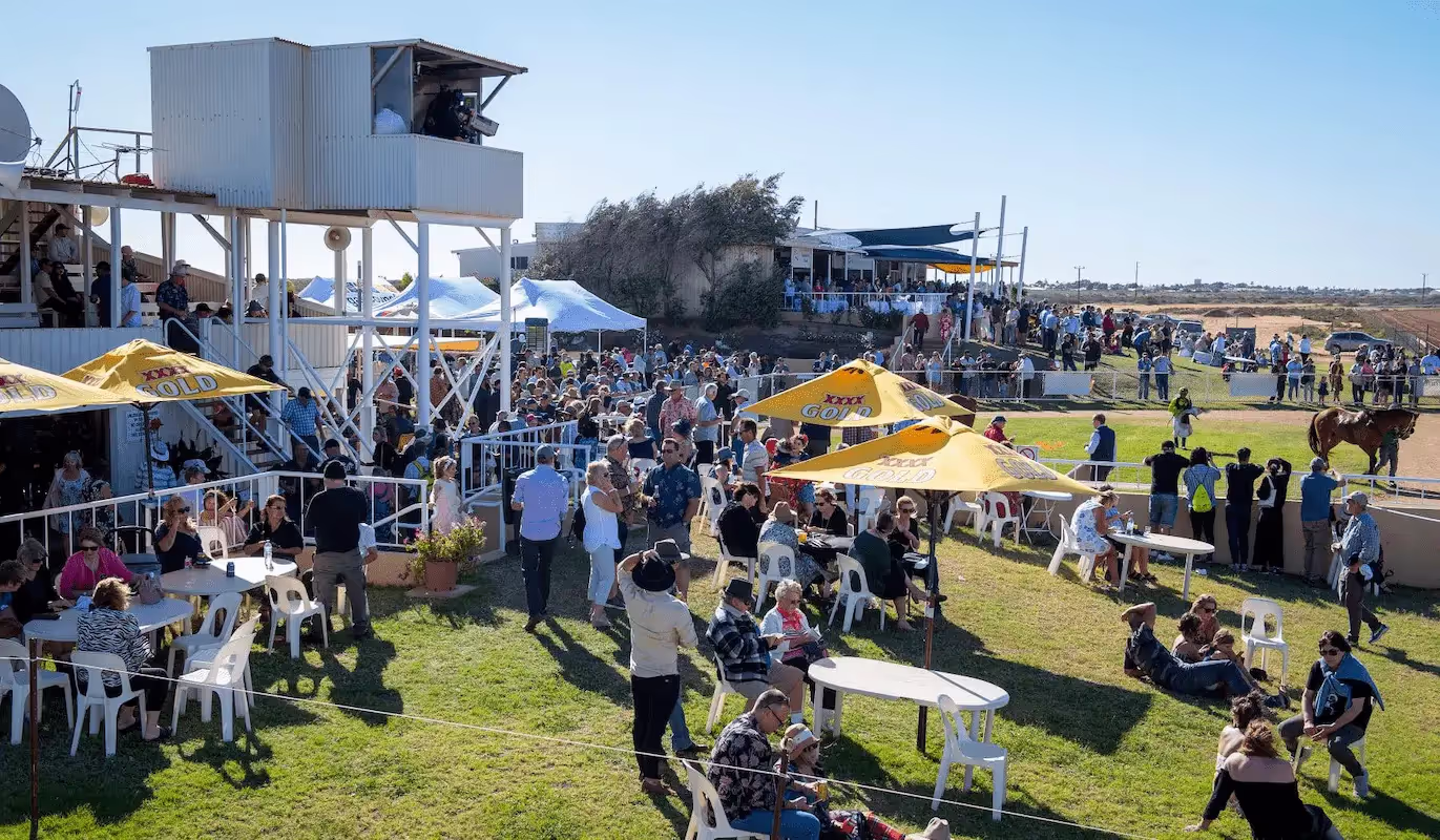 people seated and standing at Carnarvon Race Club venue