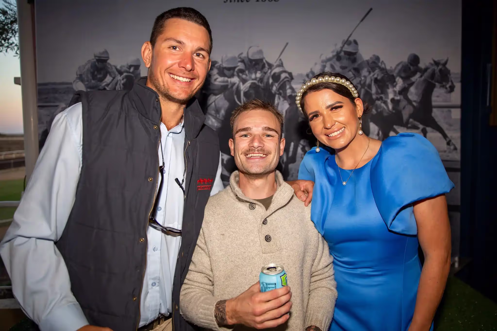 3 friends smiling for photo at Carnarvon Race Club