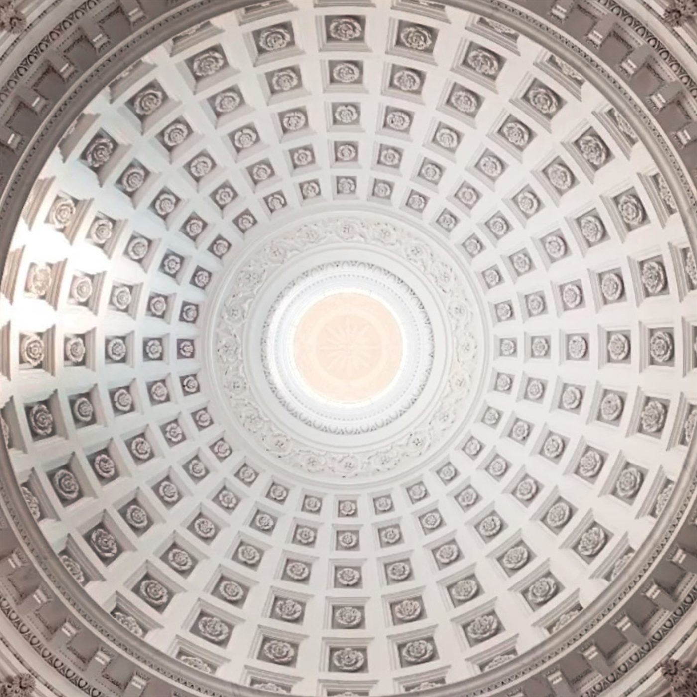 White coffered dome ceiling with central oculus
