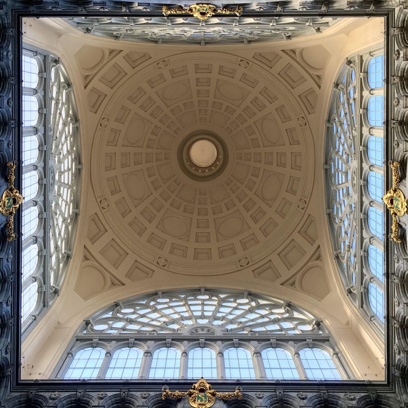 Cream coffered dome ceiling with gilded crests