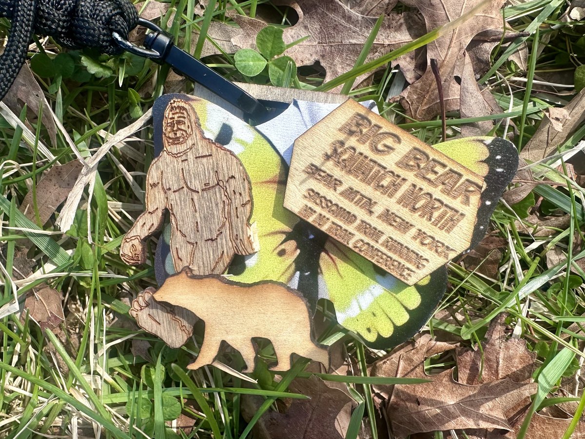 Handcrafted wooden finisher medal featuring Bigfoot and a bear, engraved with Big Bear Squatch North, Bear Mountain New York, NYNJTC