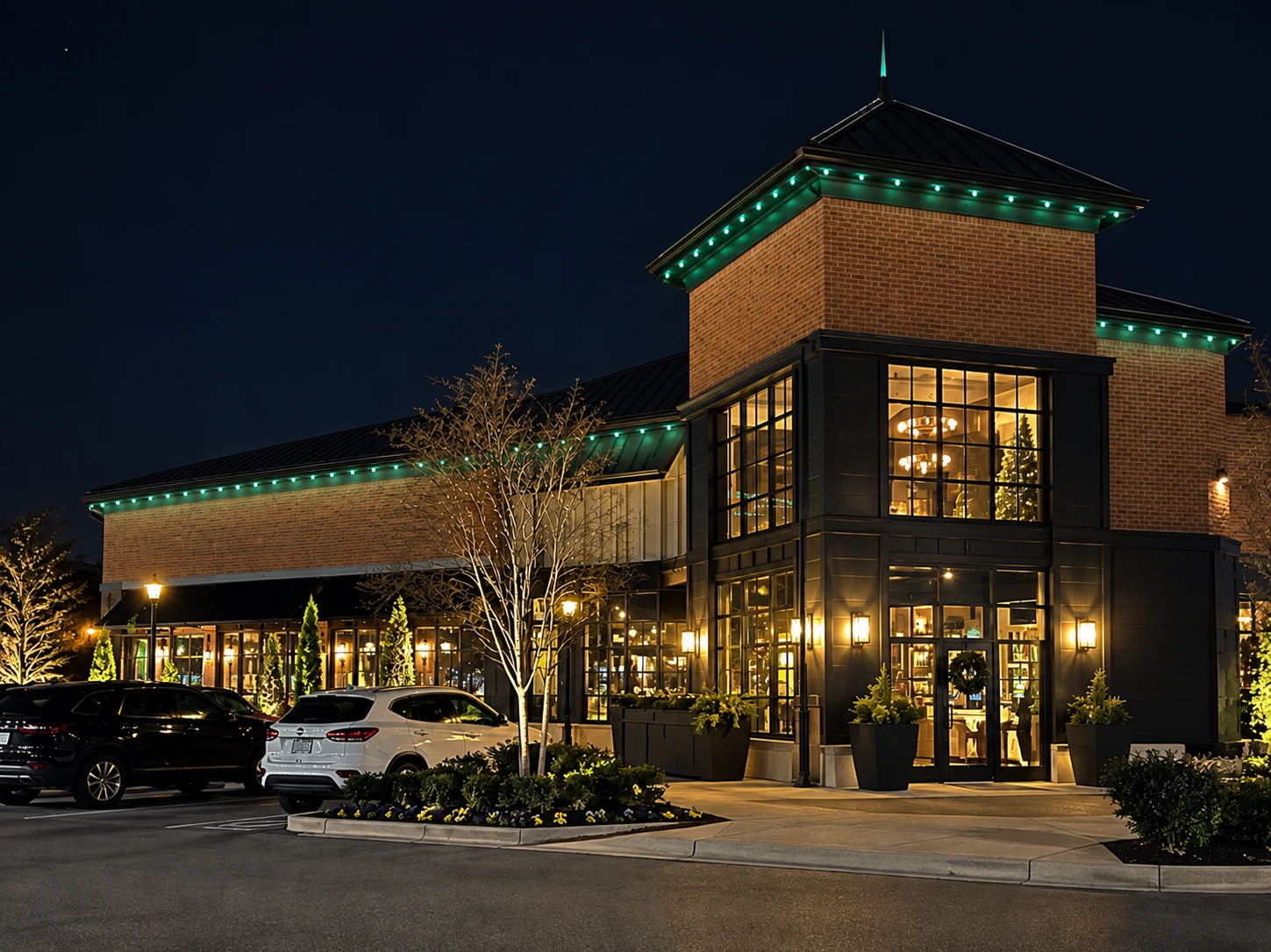 A picture of a commercial space with holiday lighting