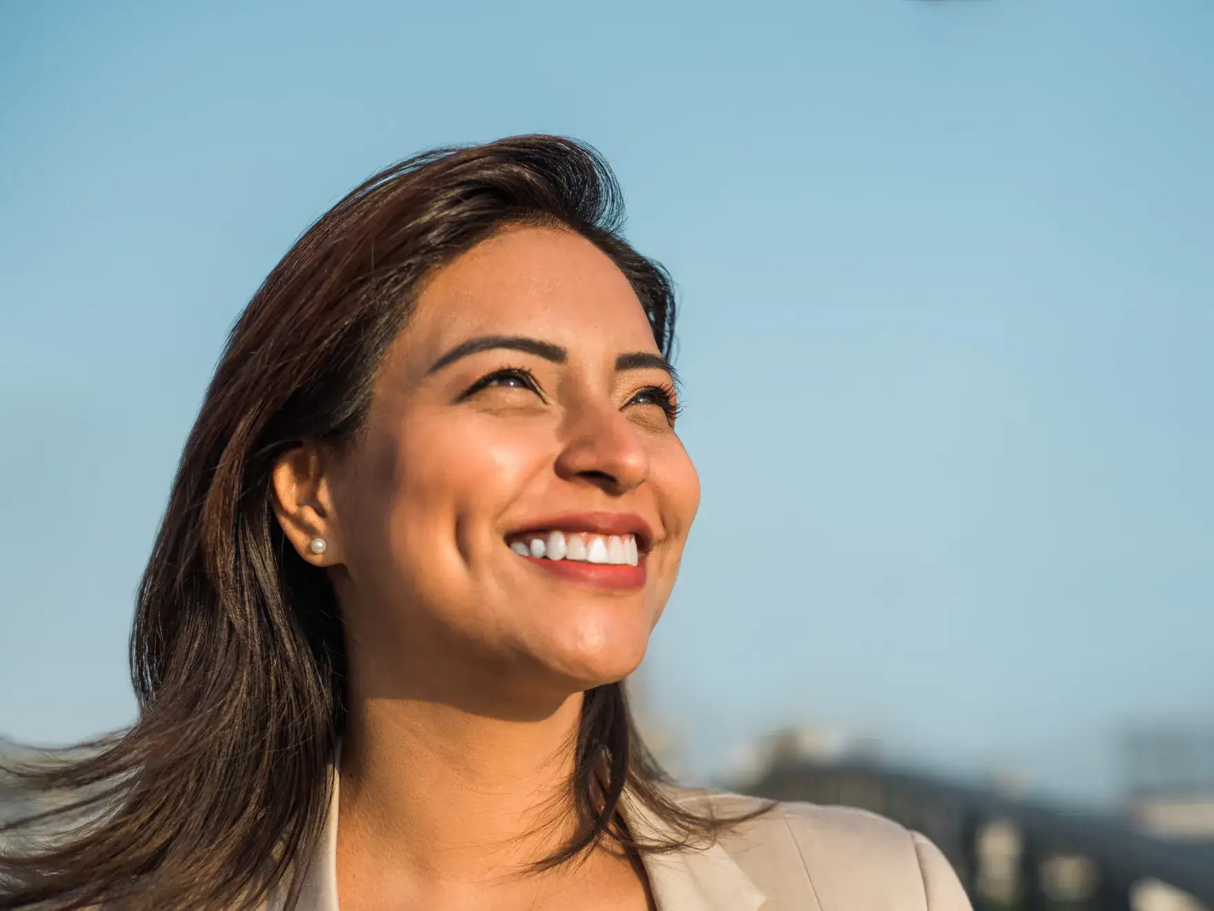 A woman with a smile on her face.