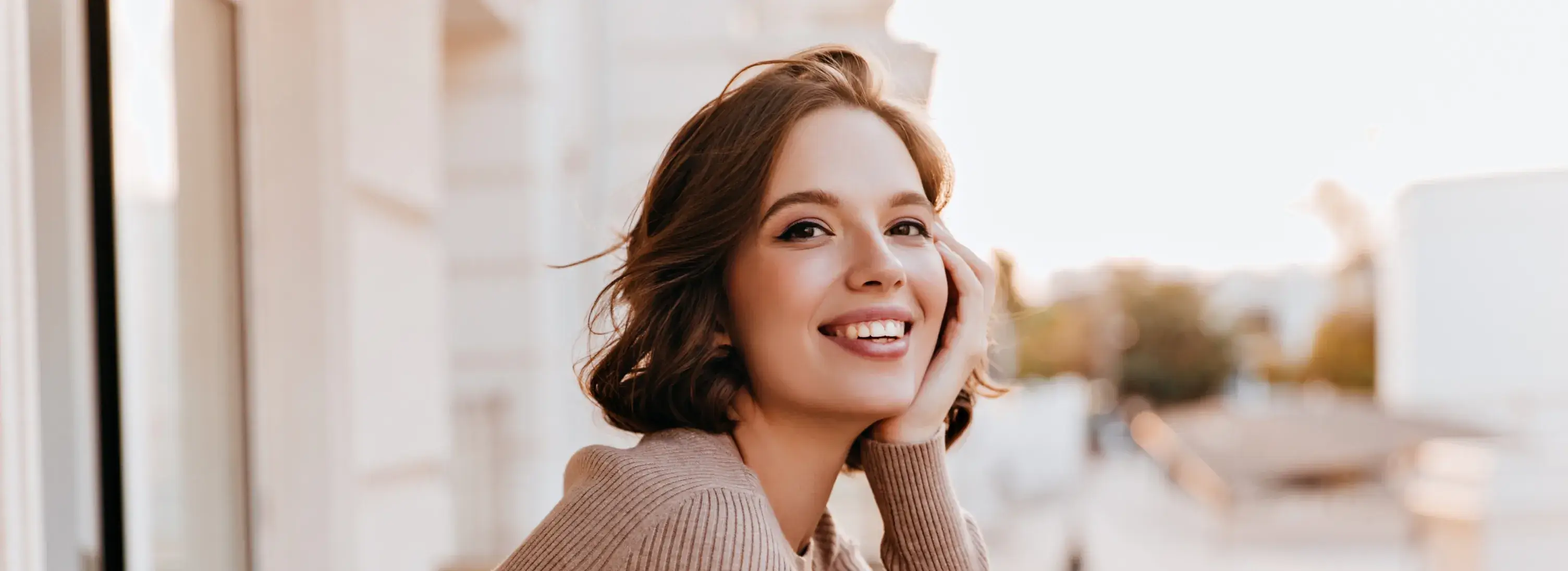 A woman with a smile on her face.