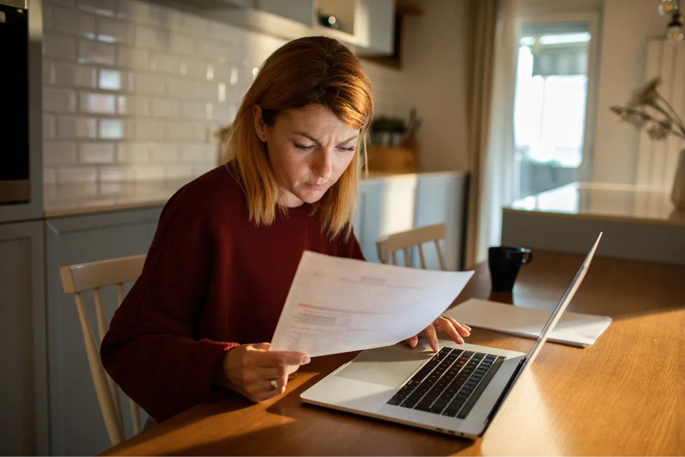 A woman reading a contract.