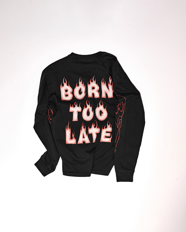 Black long-sleeve shirt with white and red flame-patterned text reading 'BORN TOO LATE' on the back.