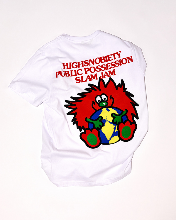 White t-shirt with red text reading 'HIGHSNOBIETY PUBLIC POSSESSION SLAM JAM' above a cartoon character holding a globe.