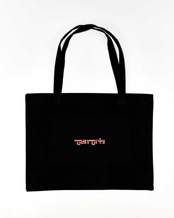 Black tote bag with two handles and the word 'Tantris' printed in red-orange in the center.