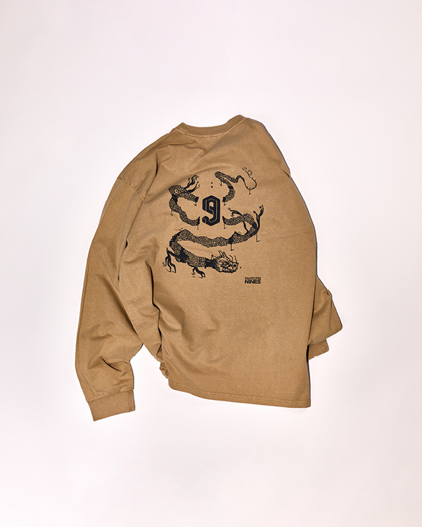 Brown long-sleeve shirt with black dragon graphic and the number 9 on the back.