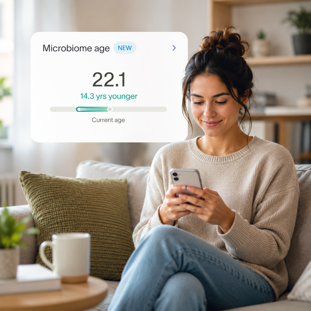 Woman on a couch viewing the Tiny Health's Microbiome Age of 22.1, 14.3 years younger than current age