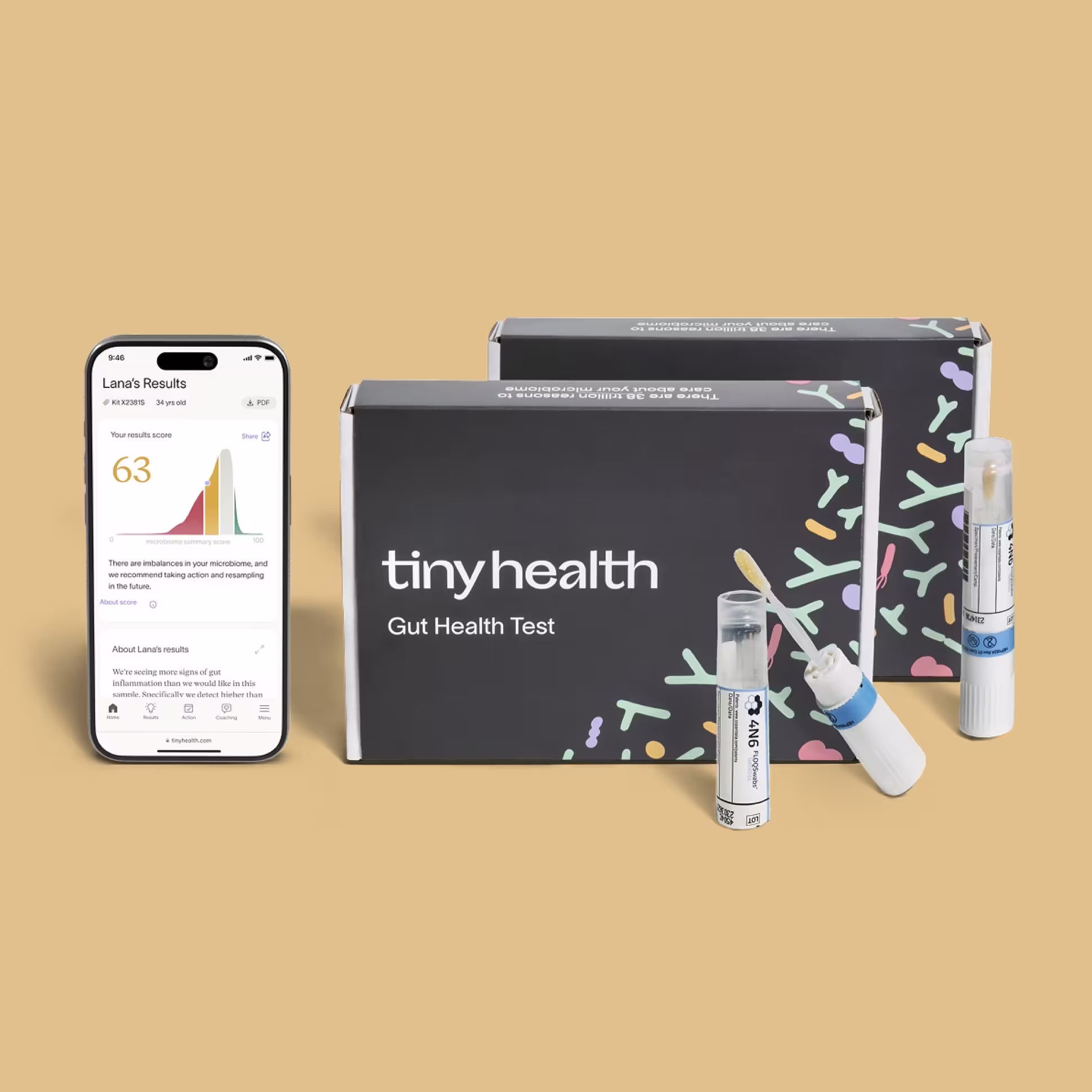 Tiny Health Gut Health Test boxes and swab collection kit beside a phone showing a gut microbiome results score of 63