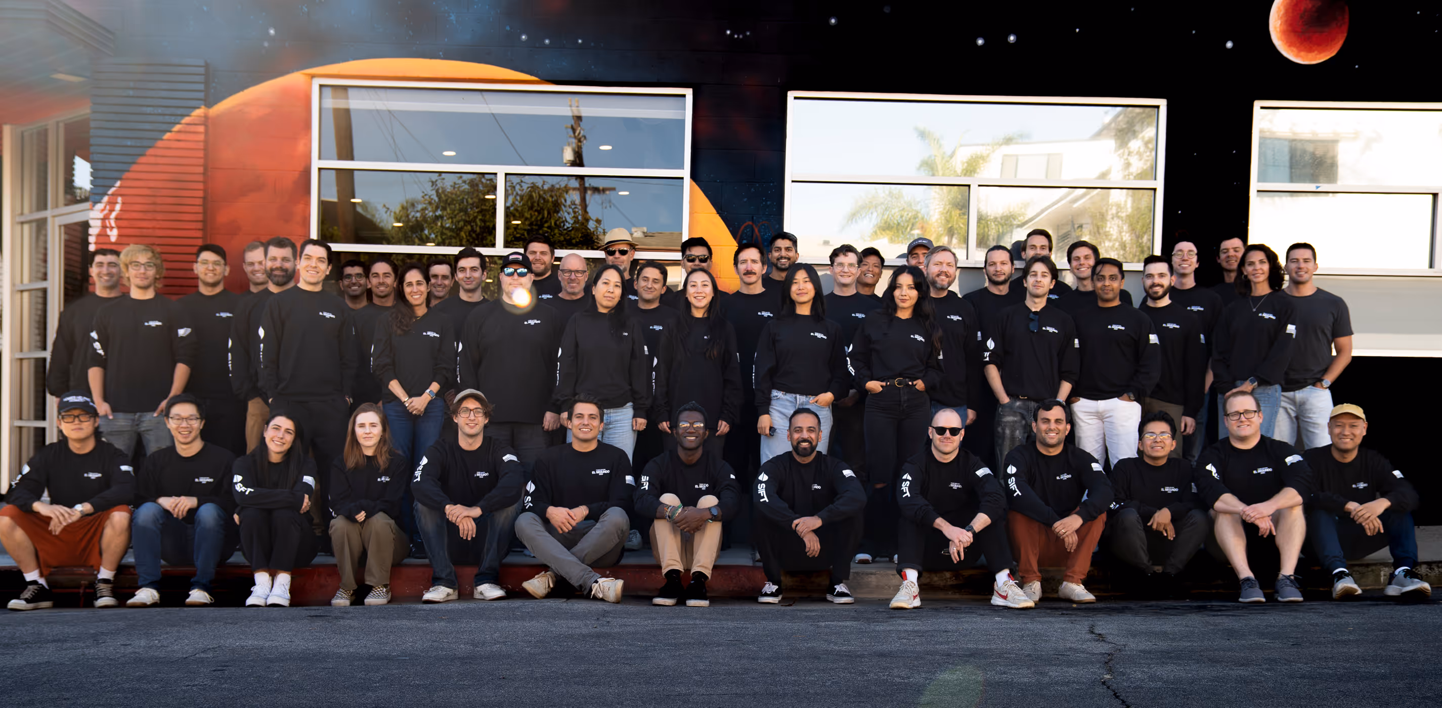 Photograph of Sift team outside the former headquarters in El Segundo