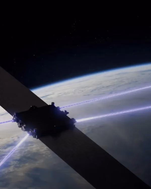 A satellite in orbit above Earth, with beams of light linking it across the horizon.