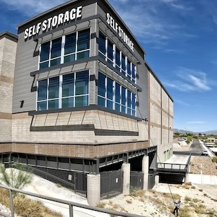 Alex doing some water fed pole window cleaning in Tucson Arizona on a self storage building