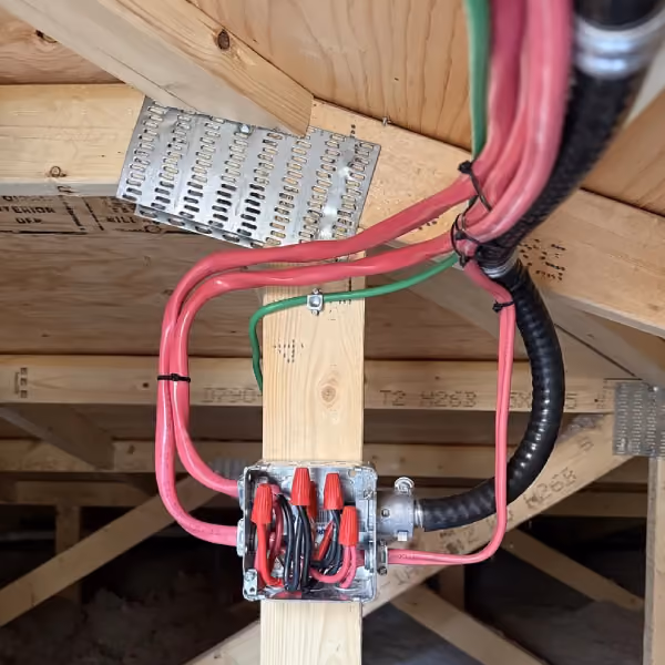 Neatly organized solar electrical connections and wiring installed by Kuby