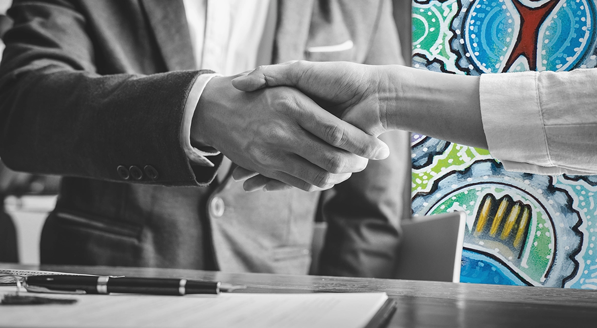 two people shaking hands