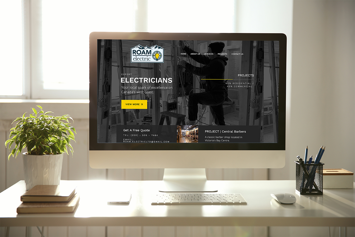 A desktop computer featuring ROAM's homepage.