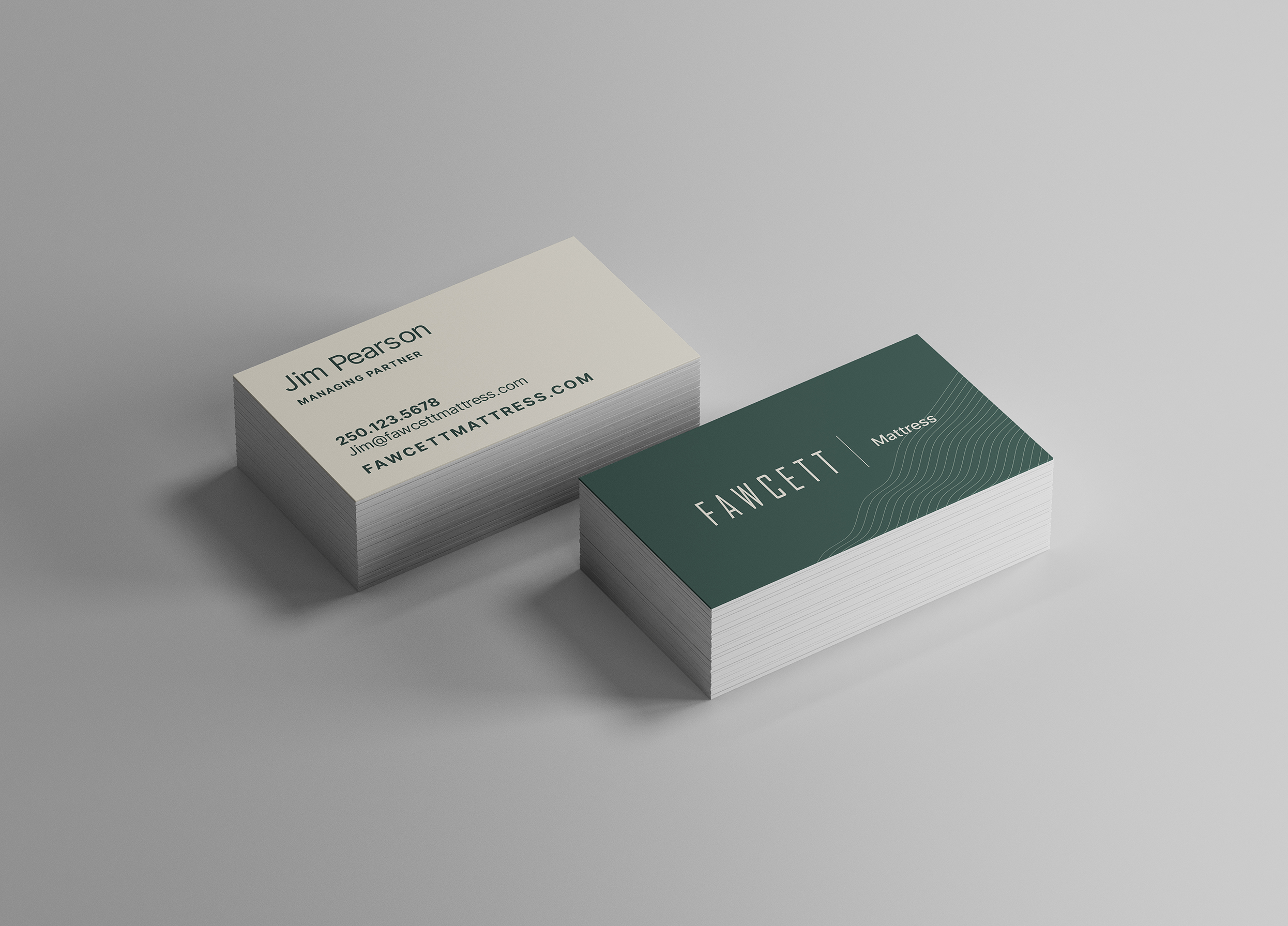 Business cards for a Fawcett Mattress employee.