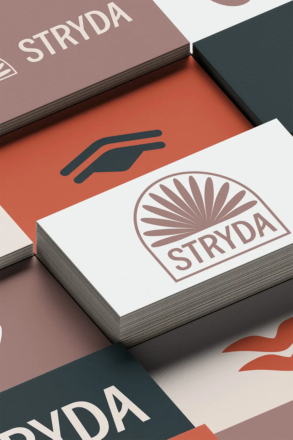 STRYDA logo alternatives and brand icons on stacks of card in various heights.