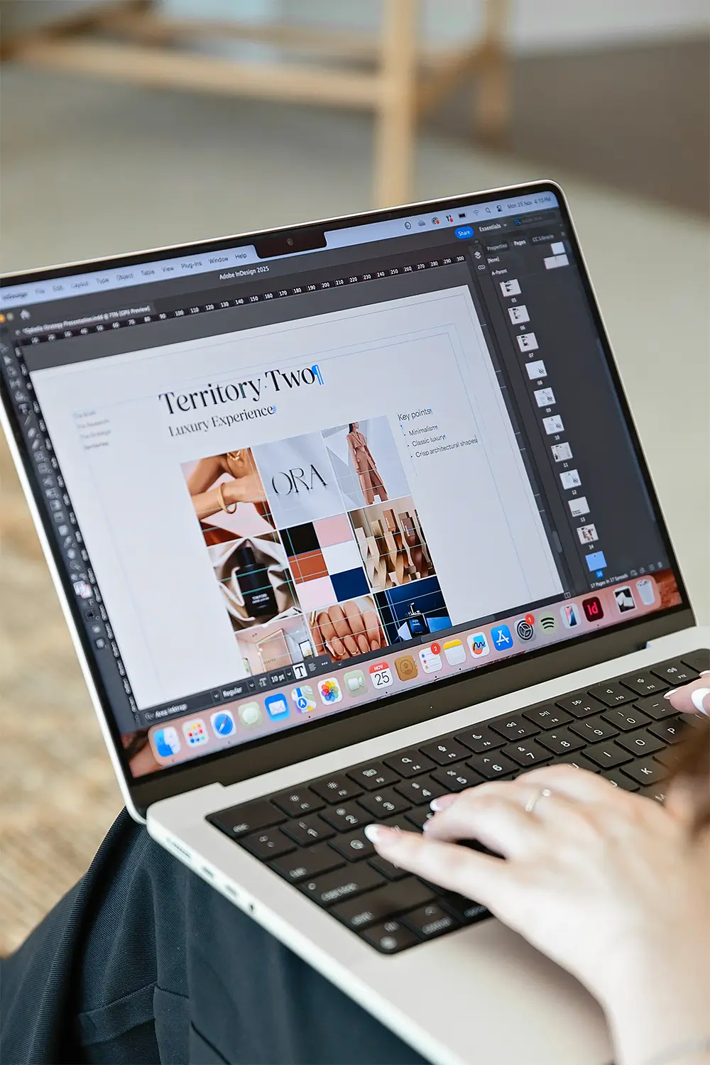 Creating a brand strategy presentation on a MacBook.