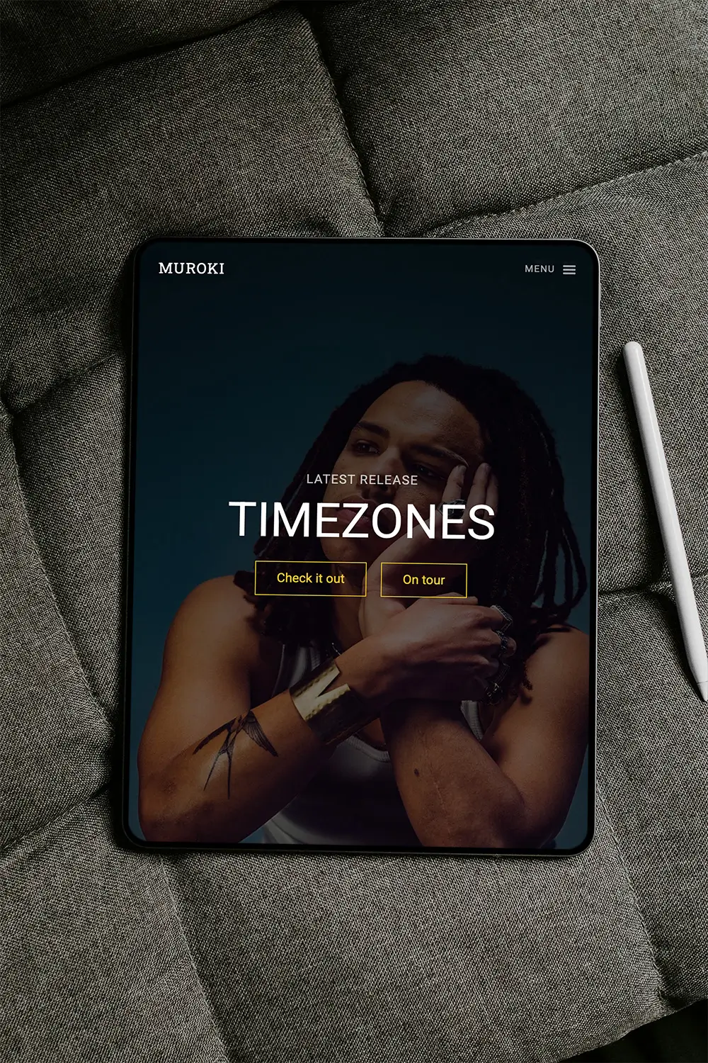 Muroki music artist website design promoting latest album mocked up on an iPad.