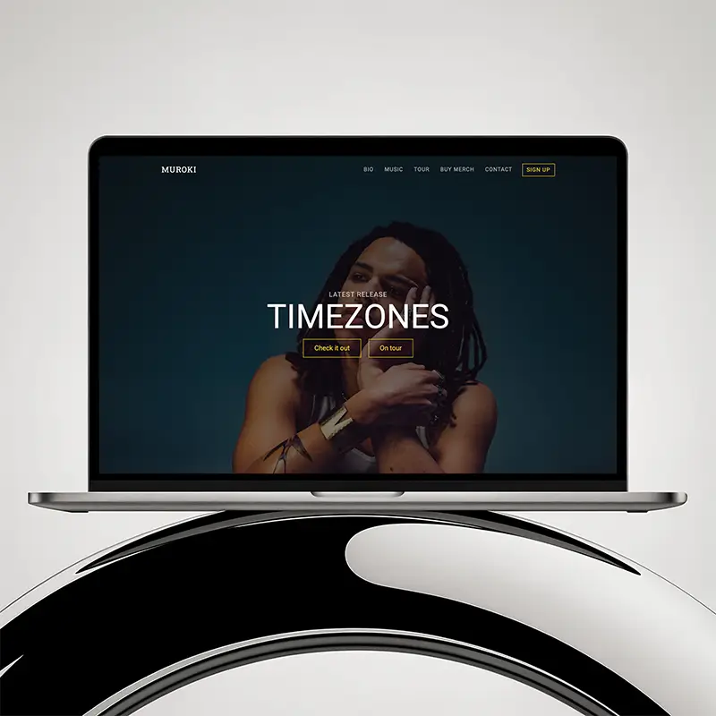 Muroki music artist website design displayed on a MacBook.
