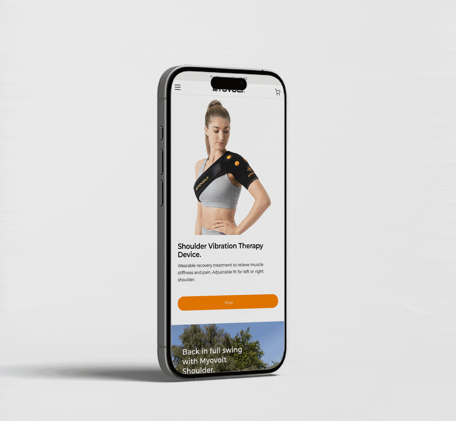 Woman wearing a Myovolt shoulder vibration therapy device on her right shoulder displayed on a smartphone screen animated scrolling with product details and a shop button.